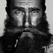 Avatar em preto e branco de um homem com barba