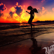 Ange silhouette surf coucher de soleil