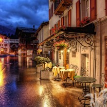 Imagens de mesas perto do café na rua à noite