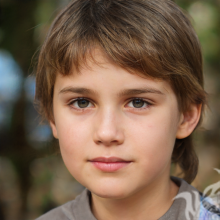 Portrait of a boy with long hair