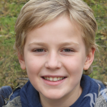 Portrait of a happy boy with blond hair