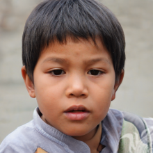 Фотография мальчика азиата с короткой прической