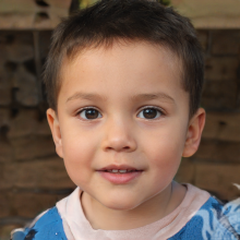 Фотография маленького мальчика брюнета с короткой стрижкой