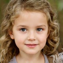 Face of a little girl with beautiful hair