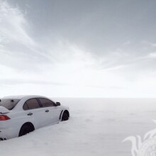 Télécharger la photo élégante Mitsubishi blanche dans la neige