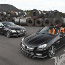 Download black cars on the background of rolls of tin for a guy for free