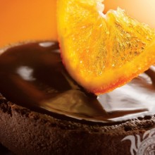 Chocolate dessert with orange slice