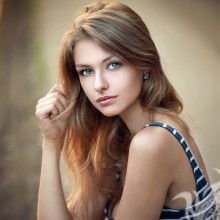 Garota de cabelos loiros no avatar VKontakte