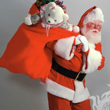 Père Noël avec un sac de cadeaux Clipart