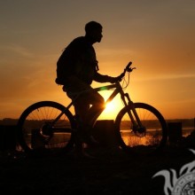 Guy on a bicycle silhouette for icon