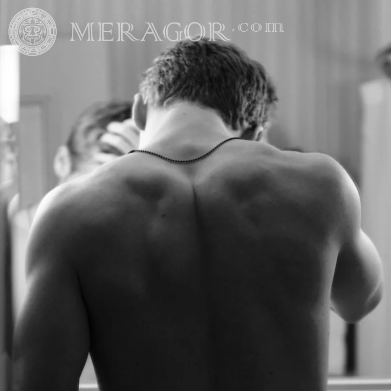 Black and white photo of a guy from back From back Black and white