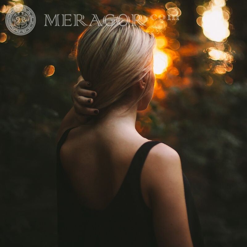 Photo of a girl from back in the evening From back