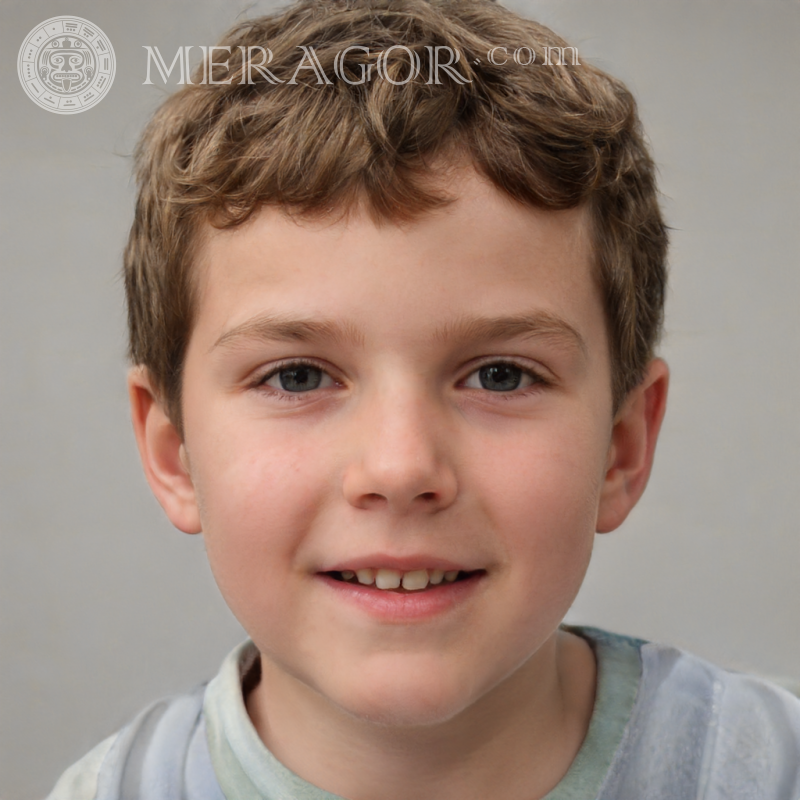 Photo of a cheerful boy on a gray background Faces of boys Babies Young boys Faces, portraits