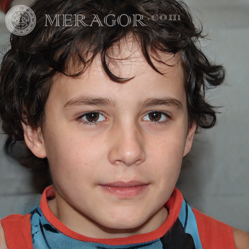 Photo of a curly-haired boy on a light background Faces of boys Babies Young boys Faces, portraits