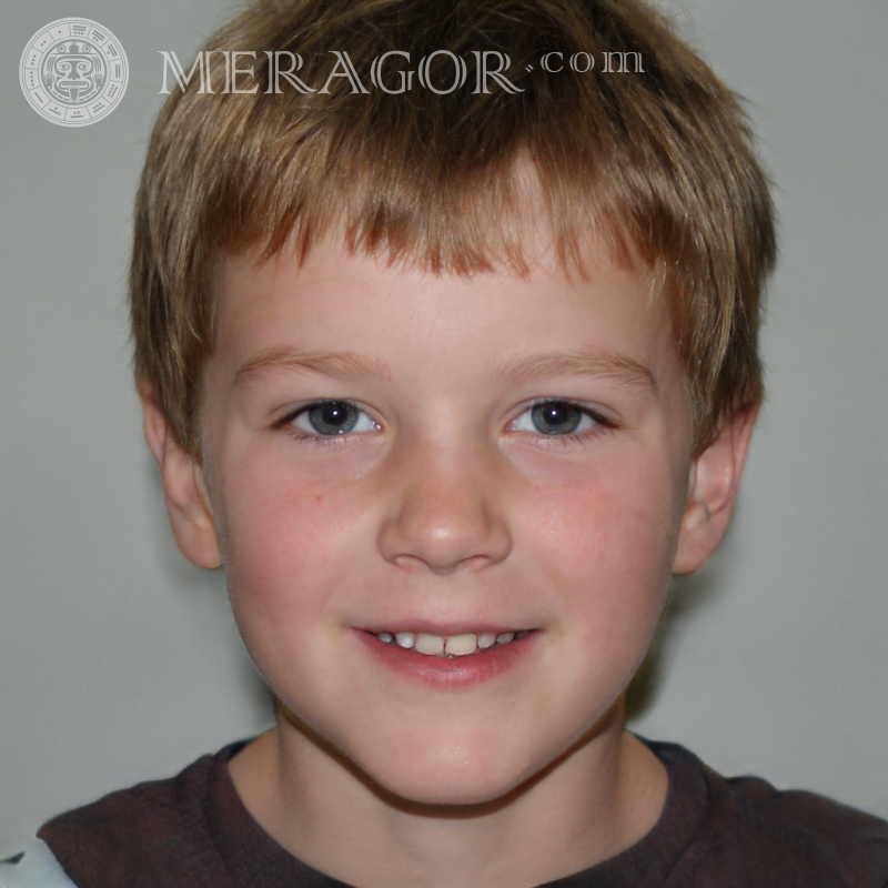 Photo of a happy red-haired boy Faces of boys Babies Young boys Faces, portraits