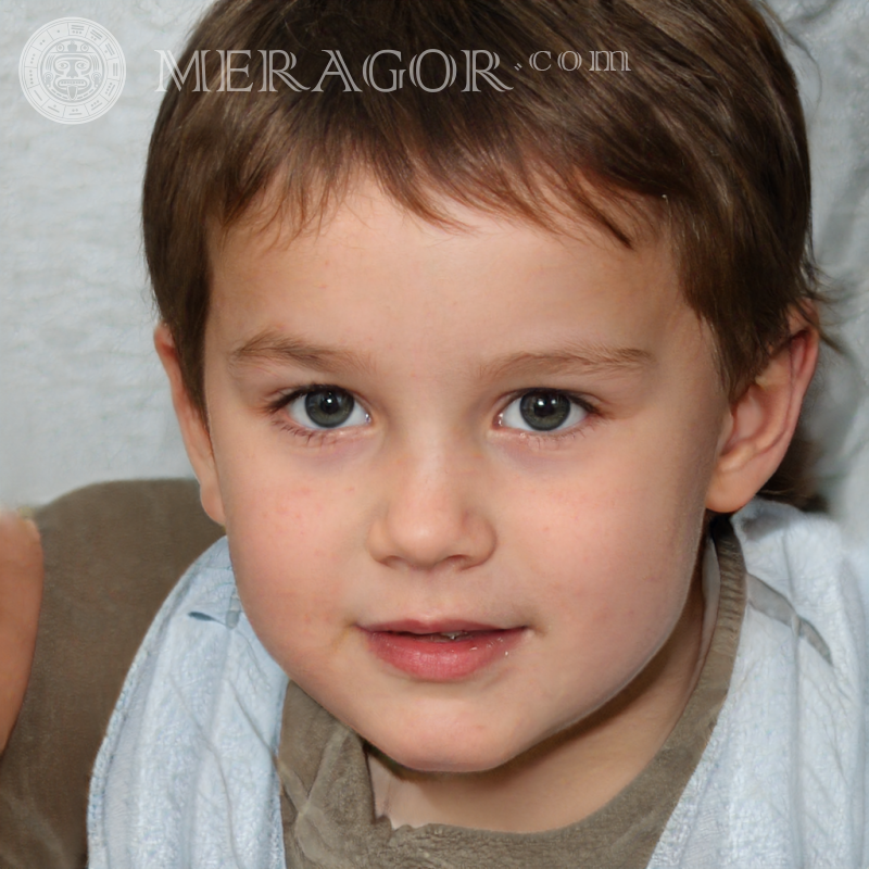 Photo of a cute little brown-haired boy Faces of boys Babies Young boys Faces, portraits