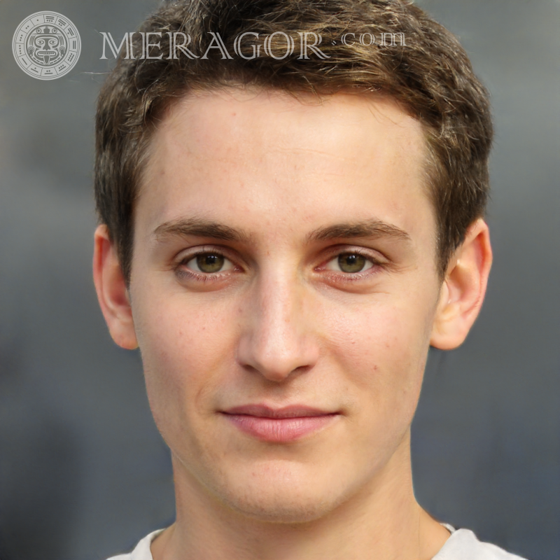 Cara de un chico de 20 años sobre un fondo gris Rostros de chicos Europeos Rusos Caras, retratos