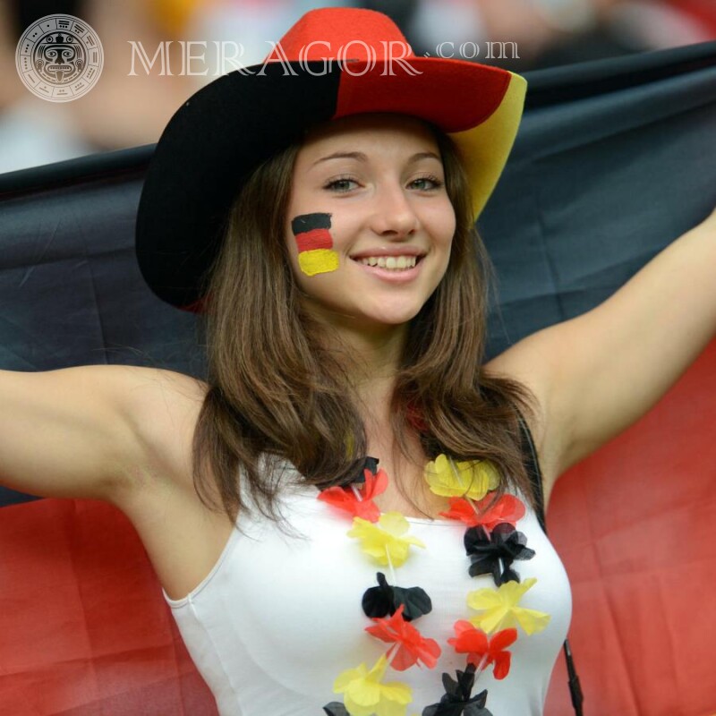 Foto de uma garota alemã no fundo da bandeira Alemães