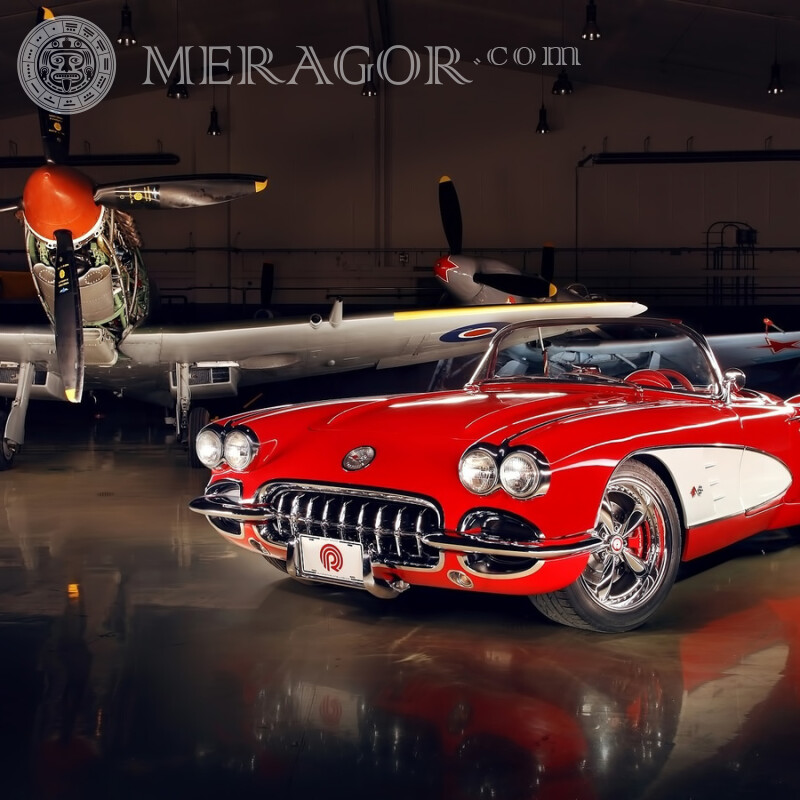 Descargue la foto de un convertible clásico en un hangar de avión para su foto de perfil Autos Transporte