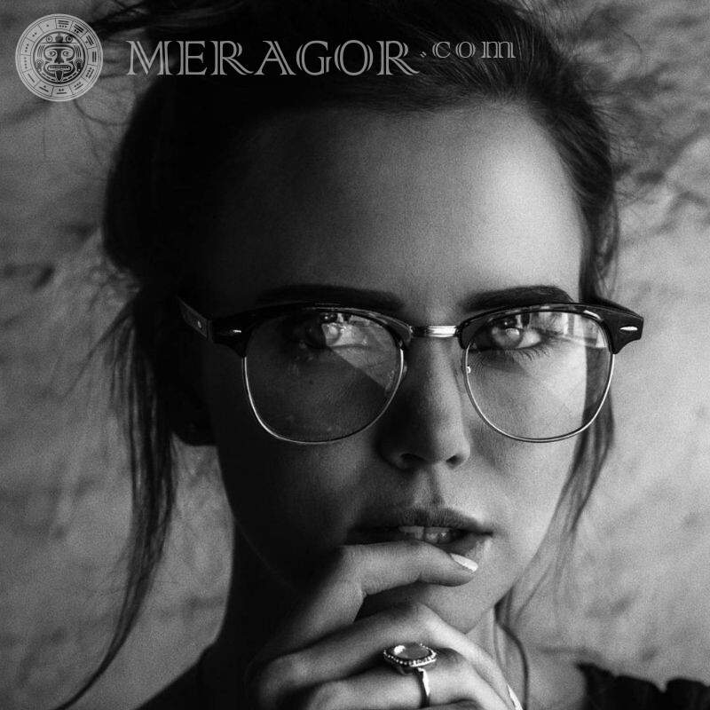 Black and white icon with a girl in glasses Black and white In glasses Faces, portraits Faces of small girls