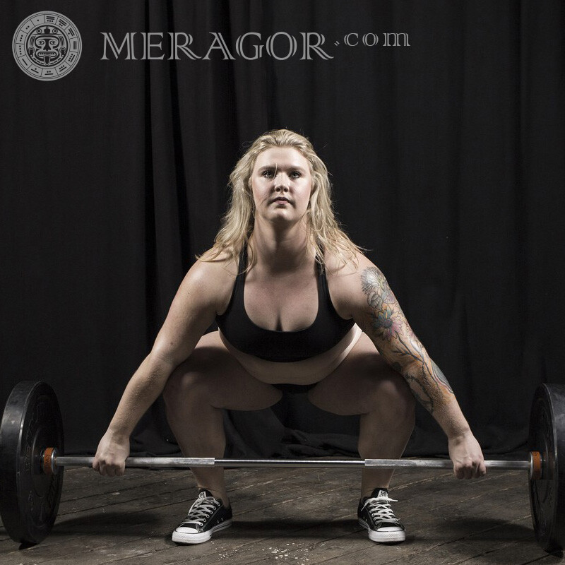 Crossfit girl barbell tattoo photo Sporty