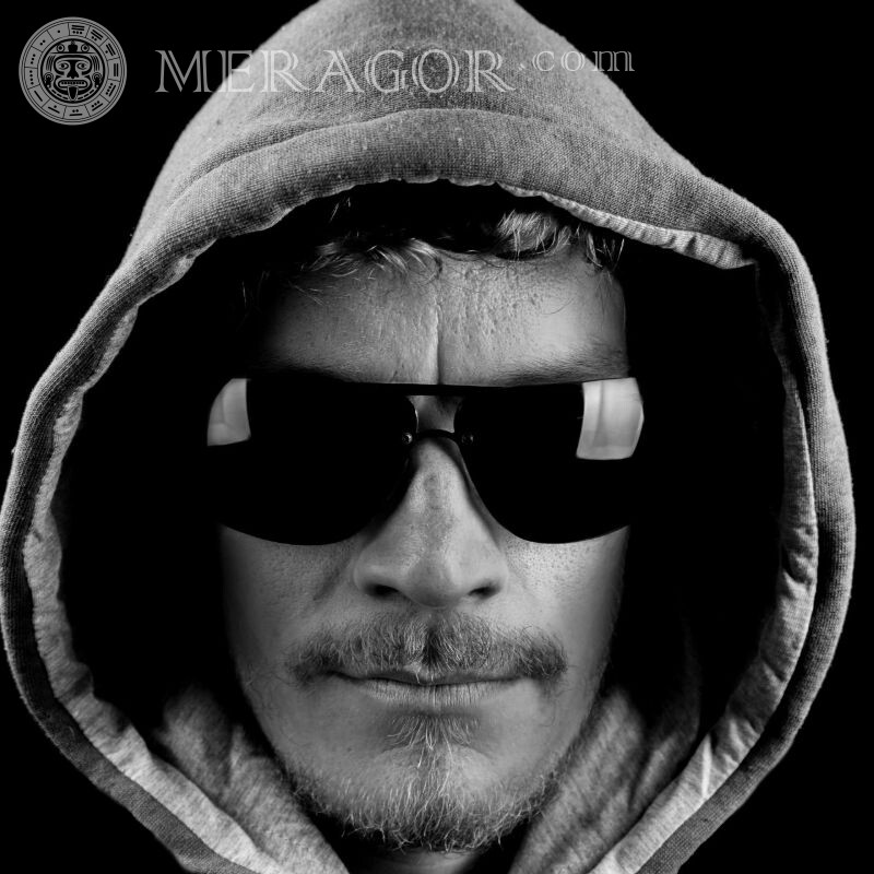 Cool photo man in black glasses Hooded In glasses Mod