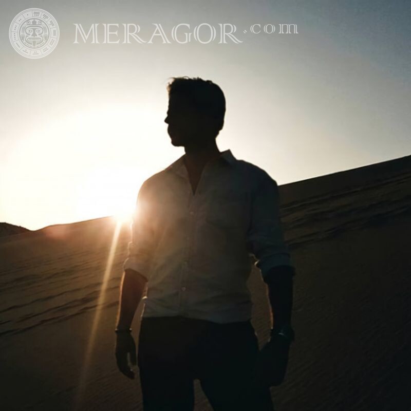 Silhouette of a man on the background of the sun download photo Silhouette