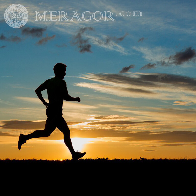Runner in the rays of the setting sun photo Silhouette Sporty